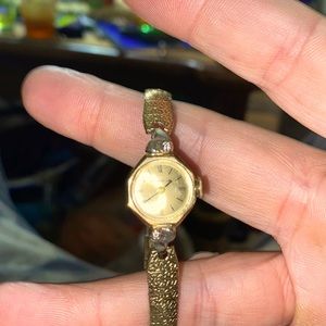 14 k gp caravelle woman’s watch.